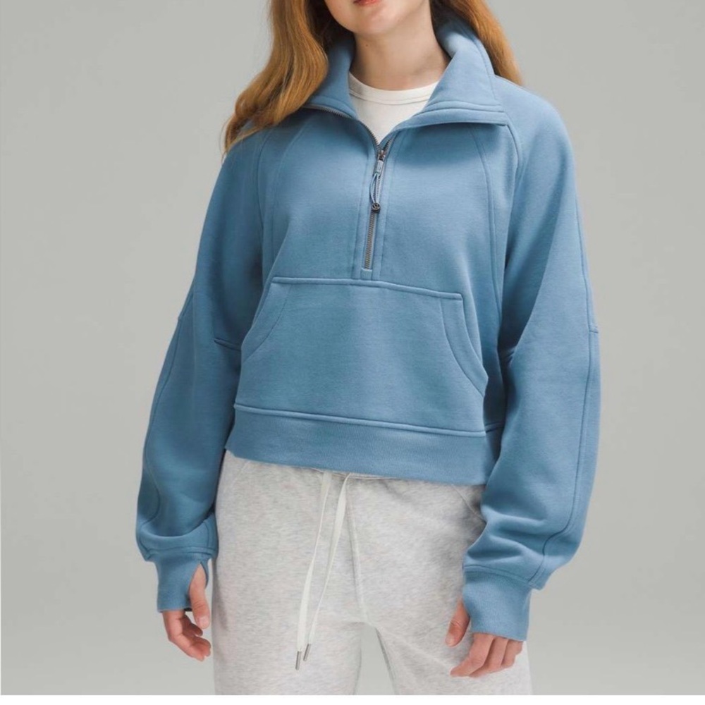 Lululemon Athletica Blue Grey Funnel Neck Hoodie
Color is more grey than blue.